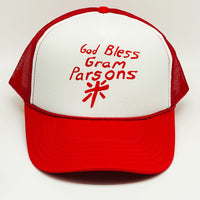 White and red 70s trucker hat with text "God Bless Gram Parsons" and a cross