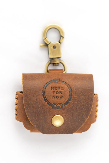Airpod Pro genuine leather case hand-stamped with the Sound as Ever signature “Here for Now” Ouroboros design