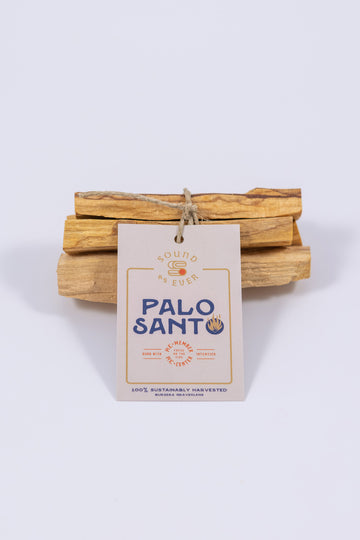 Bundle of ethically sourced palo santo sticks tied together with a tag with Sound As Ever logo