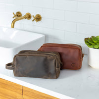 Leather dopp bag travel kits from Sound as ever in two color variations- a dark chocolate brown and a rich reddish brown