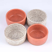 Two sets of Mezcal copitas in speckled white and speckled pink clay 