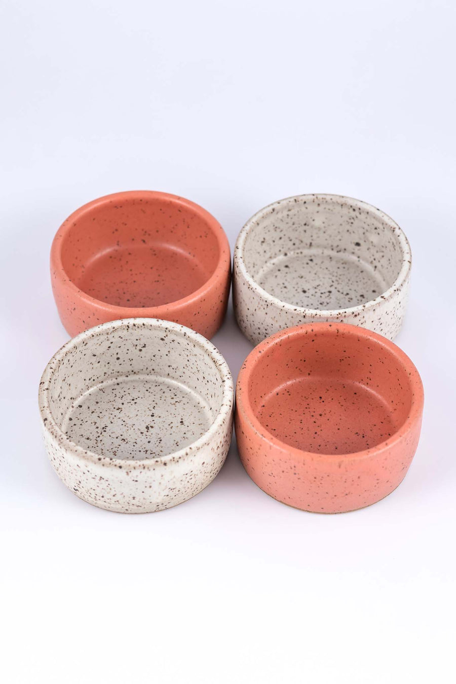 Two sets of Mezcal copitas in speckled white and speckled pink clay 