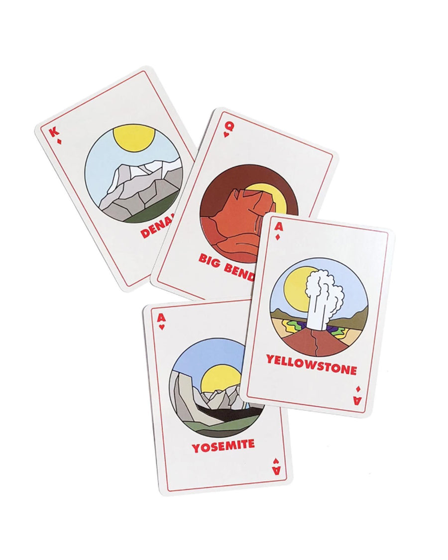 Four National park playing cards showing minimalist illustrations of Denali, Big Bend, Yellowstone, and Yosemite