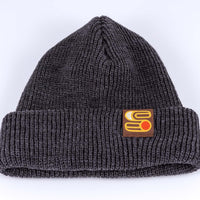 Close up view of gray Sound As Ever beanie with the Sound as Ever logo on a tag