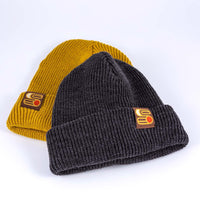 Sound As Ever Beanie shown in yellow and gray colors with Sound as Ever Logo tag