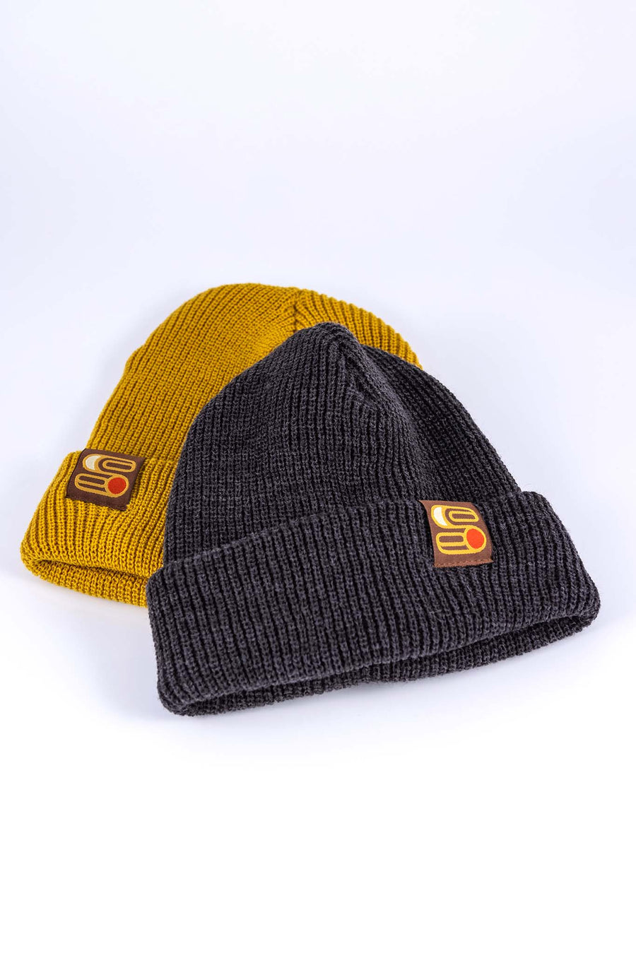 Sound As Ever Beanie shown in yellow and gray colors with Sound as Ever Logo tag