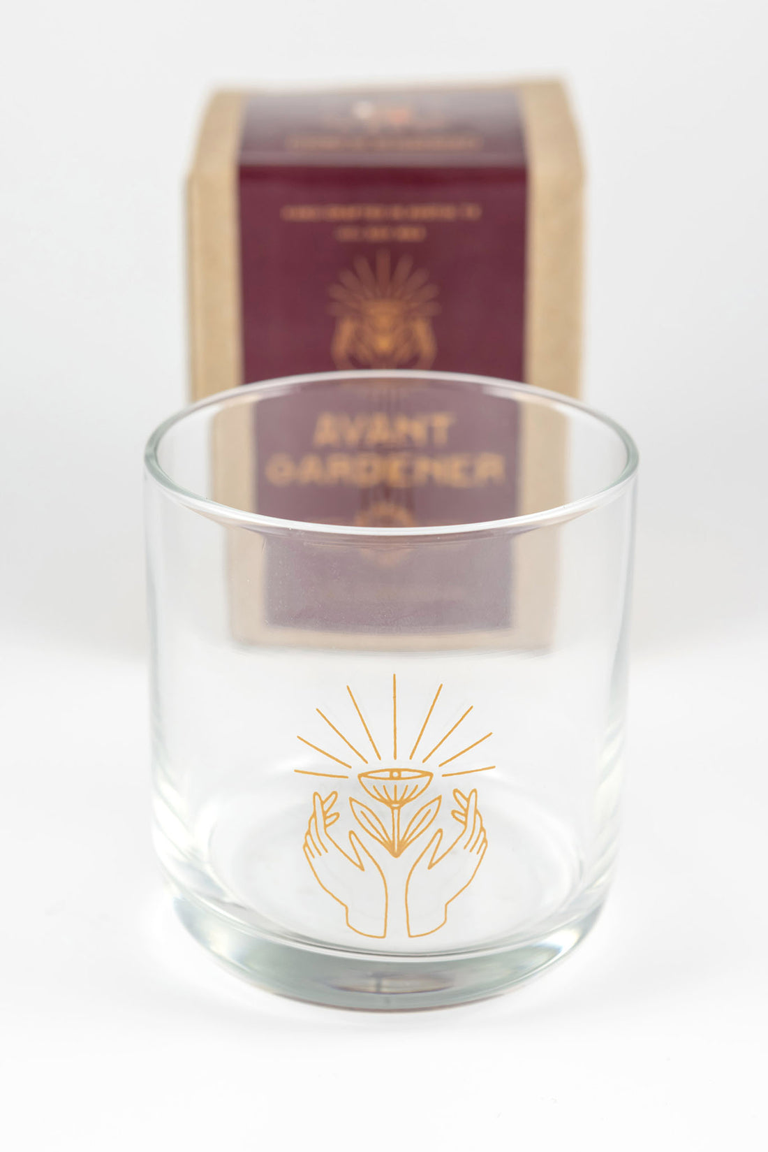 Clear glass with design from avant gardener scent that is empty after being burned and can be recycled