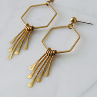 Sunburst earrings made from hammered hexagon loop and hammered brass dangles set on a stud post